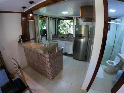 Kúpeľňa v ubytovaní Chalé e Suite Manacá
