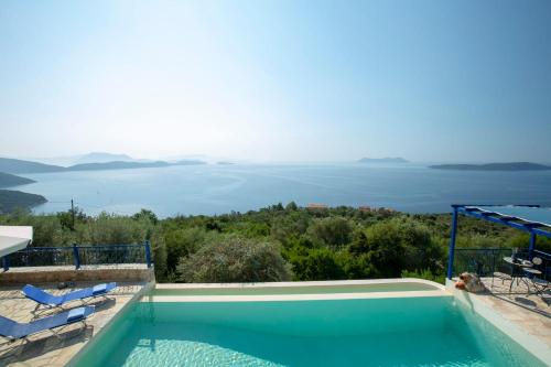 a swimming pool with a view of the water at Villa Careva - Beautiful Cozy and Luxury Villa in Sivota