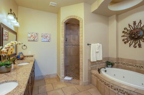 a large bathroom with a tub and a shower at H7-Heavenly-Ground Floor 3-bedroom Hillside View in Hurricane