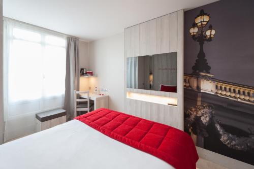 Hôtel le 209 Paris Bercy 객실 침대