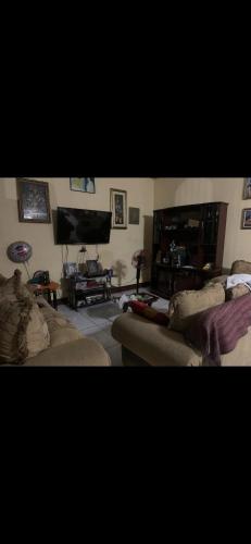Zona d'estar a Casa Cisneros Bed & Breakfast