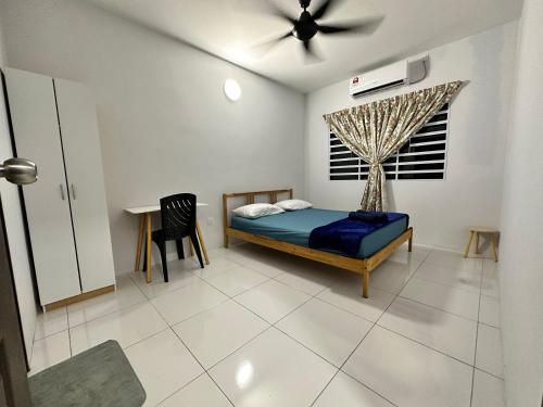 Postel nebo postele na pokoji v ubytování MZ Mutiara@Ipoh