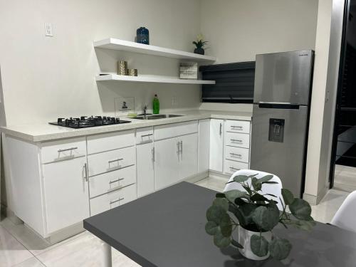 Dapur atau dapur kecil di Suites Marvento