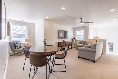 a living room with a table and chairs at The Escondido Gem, Pet Friendly, Pickleball Courts in Washington