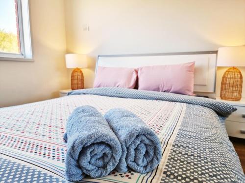 Ένα ή περισσότερα κρεβάτια σε δωμάτιο στο Rosie House-Spacious comfortable Home