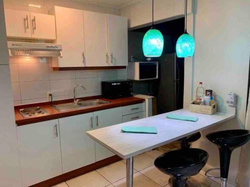 Kuchyň nebo kuchyňský kout v ubytování Espectacular vista al Mar en Avenida San Martin