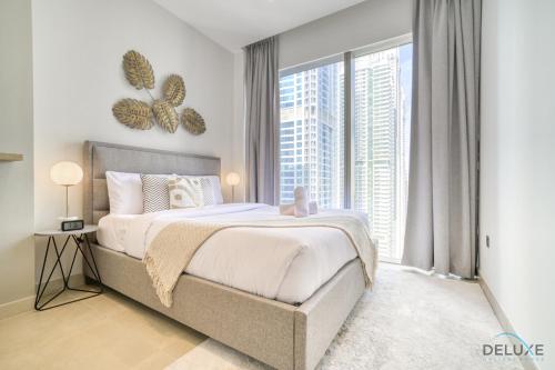 Postel nebo postele na pokoji v ubytování Surreal 1BR at The Residence Marina Gate 2 Dubai Marina by Deluxe Holiday Homes