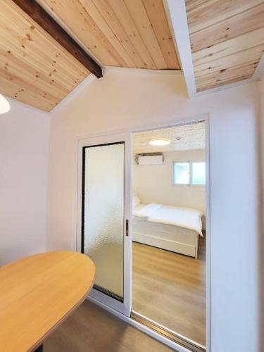 Llit o llits en una habitació de Sam House 2 Seochon