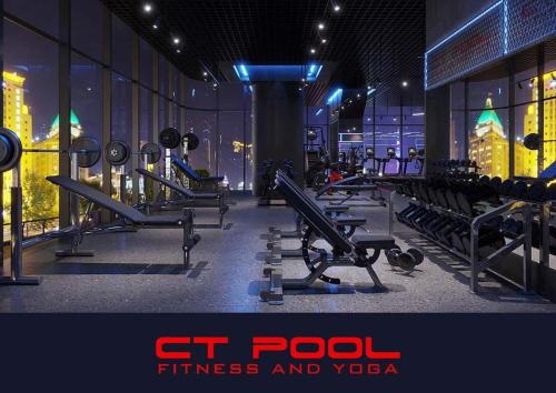 a gym with a bunch of cardio equipment in a building at LAD Apartment & Homestay Hải Phòng - Hoàng Huy Grand Tower in Hai Phong