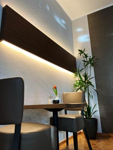 Uma área de estar em Hotel Prinz