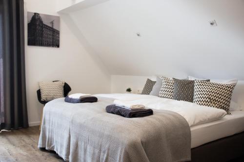 מיטה או מיטות בחדר ב-Alte Schmiede
