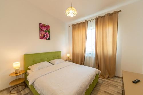 Katil atau katil-katil dalam bilik di Citadel Apartament's
