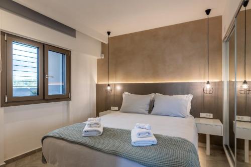 Ένα ή περισσότερα κρεβάτια σε δωμάτιο στο Ostrako Luxury Villa