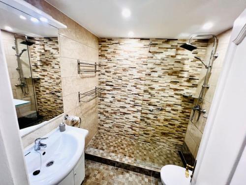 a bathroom with a sink and a shower at Elegant apartment in Amarilla Golf - FW 411 in San Miguel de Abona