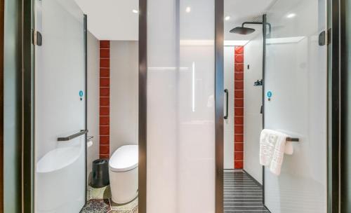 Koupelna v ubytování Houhai Hotel