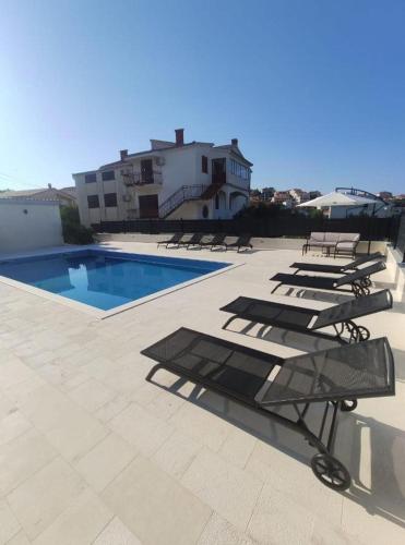 Apartment in Seget Vranjica with sea view, balcony, air conditioning, WiFi 5142-3