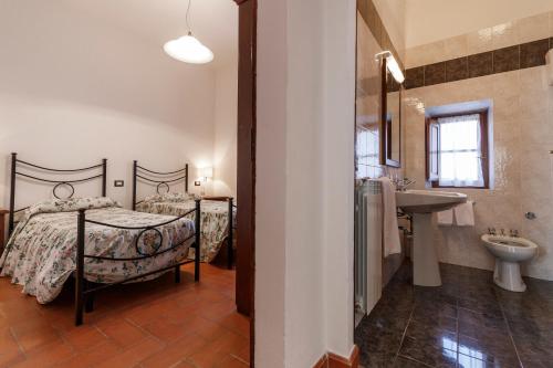 Posteľ alebo postele v izbe v ubytovaní Tenuta di Montecucco - ColleMassari Hospitality