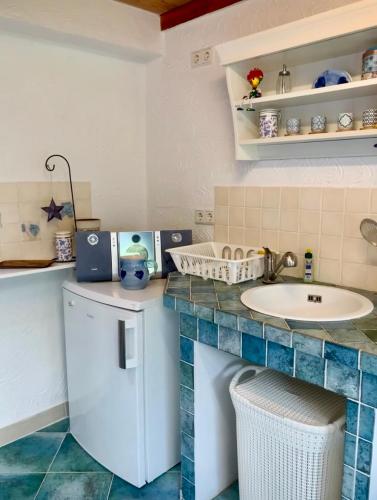 Kuchyň nebo kuchyňský kout v ubytování Boutique Hotel Shambala Zeitlos