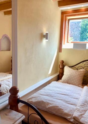 Postel nebo postele na pokoji v ubytování Boutique Hotel Shambala Zeitlos