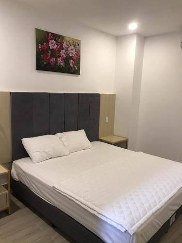 Cama o camas de una habitación en HT Hotel