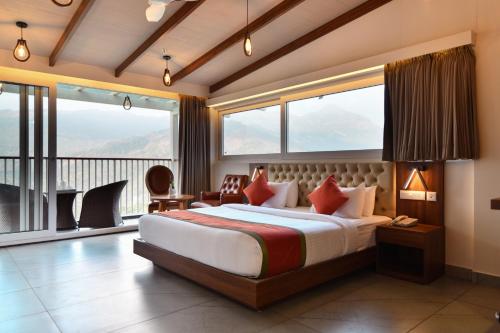 Postel nebo postele na pokoji v ubytování British County Resorts