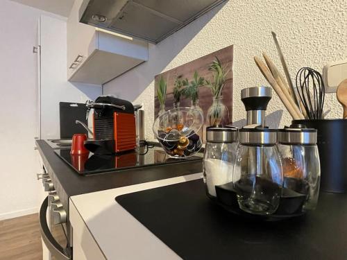 a kitchen counter with a blender on top of it at Ferienwohnung mit Vollaustattung in Waldbronn