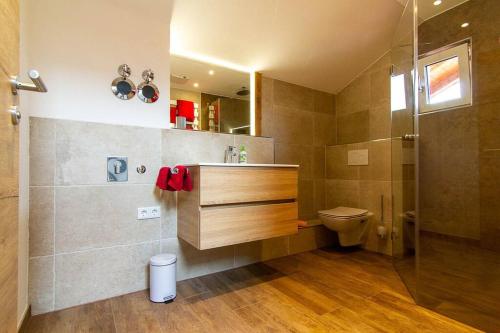 Ένα μπάνιο στο Ferienwohnung Hilde