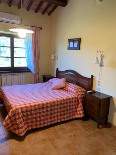 Ένα ή περισσότερα κρεβάτια σε δωμάτιο στο Agriturismo Fraschetta