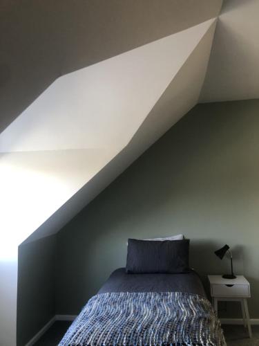 a bedroom with a bed and a white roof at Mondurup Escape - Kendenup in Kendenup