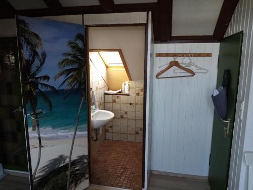 a bathroom with a shower and a sink at Casa Libra in Düsseldorf