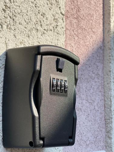 a black electrical box on the side of a wall at Apartment Lady Daniela mit Meerblick in Lovran in Lovran