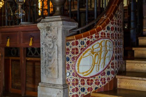 a stained glass stair railing in a church at Quinta de Santa Barbara by Heavens Sleepy in Constância