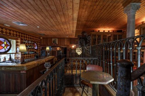 a bar in a room with a wooden ceiling at Quinta de Santa Barbara by Heavens Sleepy in Constância