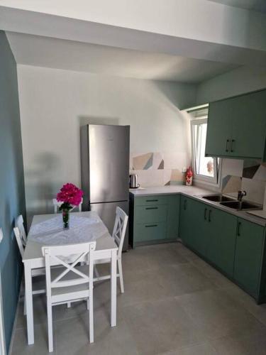 Η κουζίνα ή μικρή κουζίνα στο Leta apartament