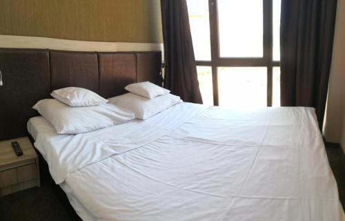 Postel nebo postele na pokoji v ubytování euroHOTEL Primorsko