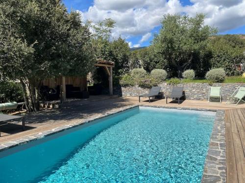 Photo de la galerie de l'établissement Villa en pierre-domaine brellinga site web, à Porto-Vecchio