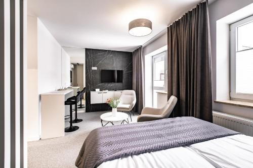 Postel nebo postele na pokoji v ubytování K20 Apartamenty Łódź - Dostęp na Kod
