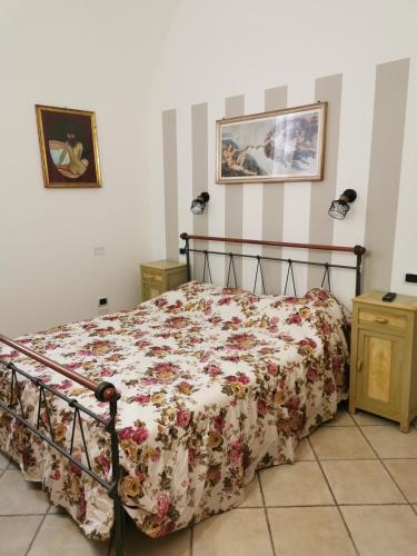 Ένα ή περισσότερα κρεβάτια σε δωμάτιο στο Cortile di San Leo