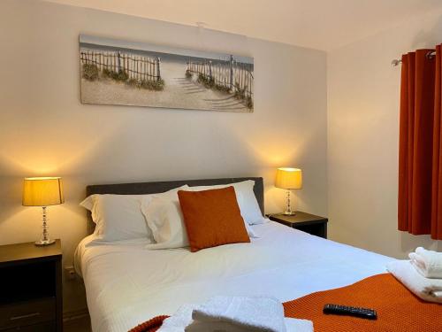 Ένα ή περισσότερα κρεβάτια σε δωμάτιο στο Kennedy House by Blackpool Service Apartments