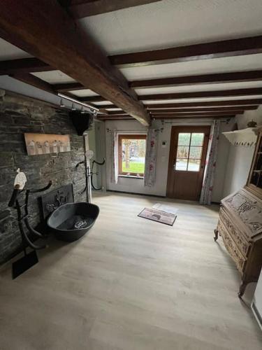 a large room with a sink in the middle of it at L'Hirondeau de Tenneville in Tenneville