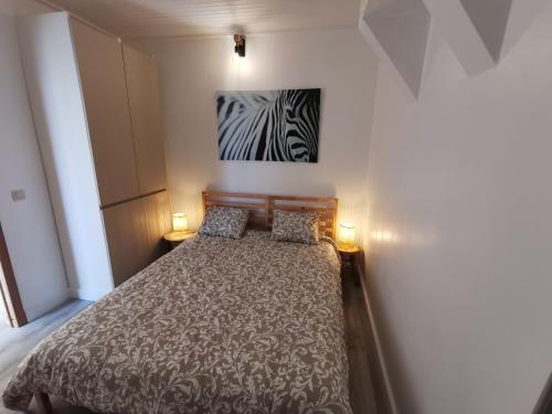 Giường trong phòng chung tại Vakantiewoning Henri Vleteren-Ieper