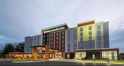 a rendering of a hotel with a building at Hilton Garden Inn Trinidad Downtown in Trinidad