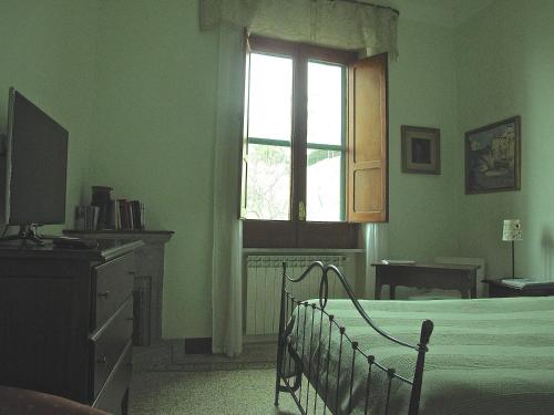 Tempat tidur dalam kamar di Torre del Sogno