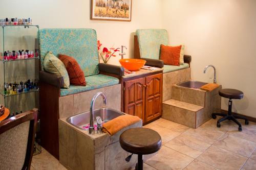 a kitchen with a sink and a counter with a sink at Bay Gardens Beach Resort & Spa in Gros Islet
