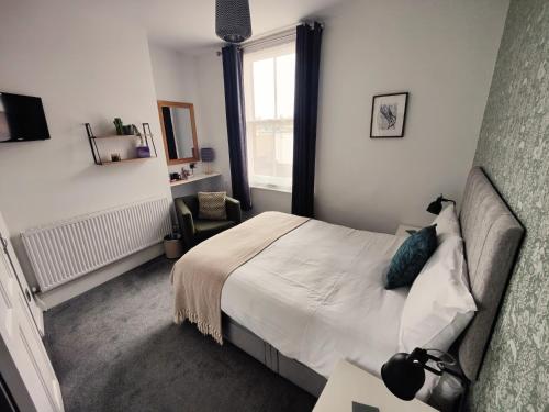 TV a/nebo společenská místnost v ubytování The Wincheap B&B