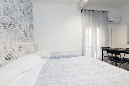 Postel nebo postele na pokoji v ubytování Le Mura room&breakfast