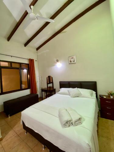 Katil atau katil-katil dalam bilik di Casa Glamour