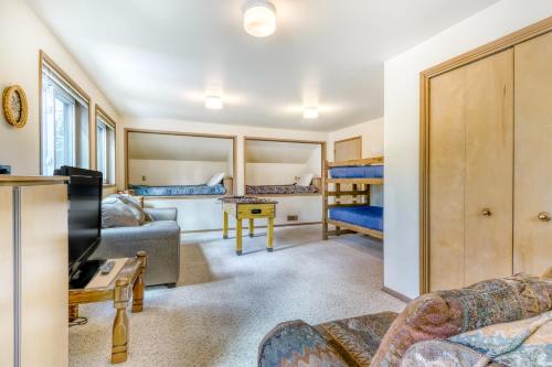 a living room with a couch and bunk beds at Mt View Lane 7 | Discover Sunriver in Sunriver