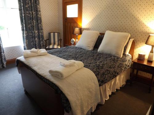Postel nebo postele na pokoji v ubytování Karetu Downs Farm Stay