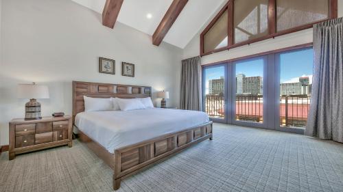a bedroom with a bed and a large window at Zalanta 325 in South Lake Tahoe